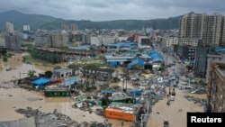 Dajing town is seen damaged and partially submerged in floodwaters in the aftermath of Typhoon Lekima in Leqing, Zhejiang province, China, Aug. 10, 2019.