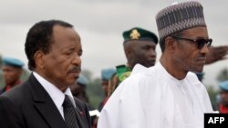 Shugaban kasar Kamaru Paul,Biya da Shugaban kasar Najeriya Muhammad Buhari cikin farar riga