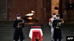 TOPSHOT - French army soldiers stand by the coffin of Missak Manouchian, a hero of the French Resistance in World War II of Armenian origin who was executed by occupying Nazi forces in 1944, during a ceremony at the Mont Valerien in Suresnes, west of Paris, on February 20, 2024.