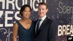 FILE - Priscilla Chan and Mark Zuckerberg are expecting a baby girl.