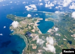 FILE - An aerial view of U.S. Naval Base Guam taken Sept. 20, 2006.