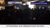 VOA60 Africa - South Africa: Protesters torch trains and smash windows at Cape Town's central rail station