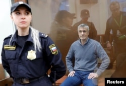 Founder of the Baring Vostok private equity group Michael Calvey, who was detained on suspicion of fraud, sits inside a defendants' cage as he attends a court hearing in Moscow, Feb. 15, 2019.