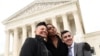 FILE - Sara Ramirez, Laverne Cox and Chase Strangio pose outside the Supreme Court in Washington, Oct. 8, 2019. Strangio is the lead lawyer in a 2024 case challenging a Tennessee law on transgender rights, becoming the first transgender person to argue before the justices.