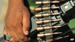 The ammunition of a rebel fighter is seen as he arrives at Green Square in the Kish, Benghazi July 6, 2011, from all the freed areas of Libya to demonstrate against Muammar Gaddafi and his regime.