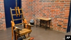 FILE - This March 2019 photo, provided by the South Carolina Department of Corrections, shows the state's electric chair in Columbia, S.C. 