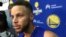 Golden State Warriors Stephen Curry takes questions from the media after NBA basketball practice in Oakland, California, Sept. 23, 2017.. 