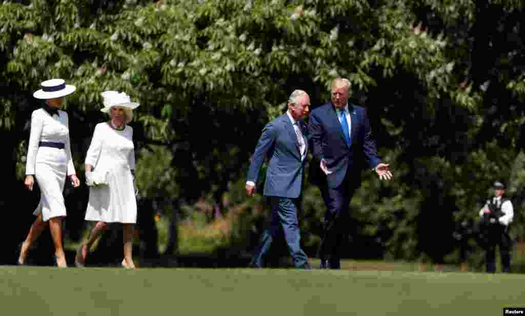 Президент США Дональд Трамп и первая леди Мелания Трамп встретились с принцем Чарльзом и герцогиней Корнуольской Камиллой. Букингемский дворец, Лондон, 3 июня 2019. &nbsp;