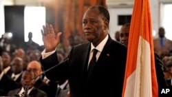Alassane Ouattara is sworn into office as Ivory Coast's president on May 6, 2011 at the presidential palace in Abidjan after months of political violence