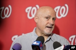 FILE - In this Jan. 11, 2020 photo, Nationals general manager Mike Rizzo talks with members of the media.