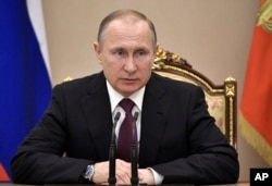 ປະທານາທິບໍດີ ຣັດເຊຍ ທ່ານ Vladimir Putin ປະທານ ກອງປະຊຸມ ສະພາຄວາມໝັນຄົງແຫ່ງຊາດ ໃນນະຄອນຫຼວງ Moscow, ວັນ ທີ 31 ມີນາ 2017.