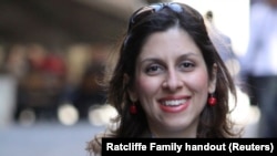 FILE - Nazanin Zaghari-Ratcliffe, who works for the Thomson Reuters Foundation, has been jailed in Iran since early 2016 following her arrest at the Tehran airport as she tried to return to Britain with her daughter following a family visit.