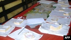 View of voter cards in Conakry on Sept. 26, 2013, on the last campaign day for Guinea's parliamentary elections.