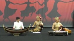 A co-founder and a performer of the Somapa Thai Dance Company, Suteera Nagavajara (center) performs the Thai classical song - Mayura Pirom or Dance of a Peacock during the DC Travel Show event at the Washington Convention Center, Washington, DC. March 17,