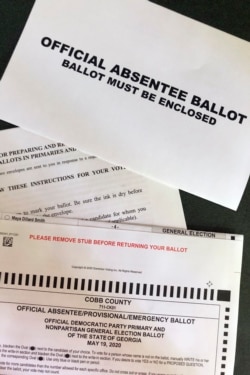 A Cobb County absentee ballot is seen May 5, 2020, in Kennesaw, Georgia.