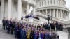 Newly-elected members of Congress pose for a class photo on the East Front of the Capitol in Washington, Nov. 15, 2022. 