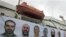 A banner depicting the faces of the nine men killed, displayed on the Mavi Marmara ship, the lead boat of a flotilla headed to the Gaza Strip, which was stormed by Israeli naval commandos in a predawn confrontation in the Mediterranean May 31, 2010,.