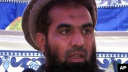 FILE - Pakistani Zaki-ur-Rehman Lakhvi speaks during a rally at Muzaffarabad, in Pakistani controlled Kashmir.