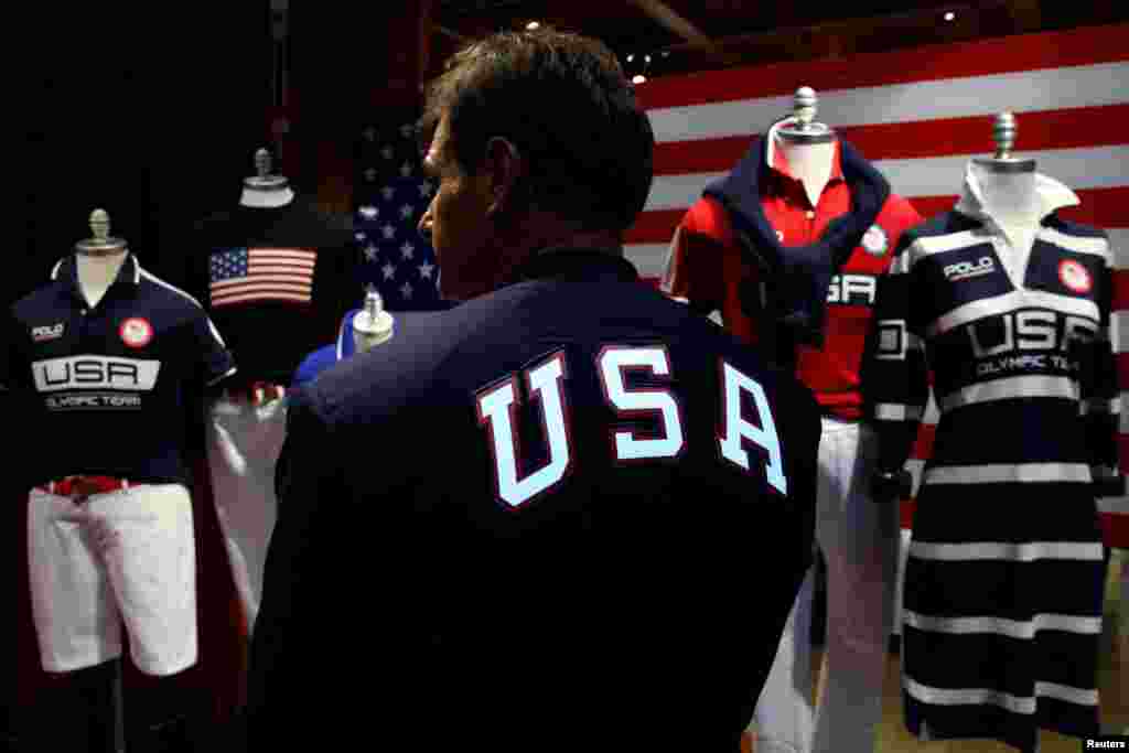 Cliff Meidl, two-time U.S. Olympic athlete, models the official Team USA Opening Ceremony flag-bearer outfit which will include special electroluminescent panels, at the Polo Ralph Lauren store in New York City.