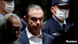 ormer Nissan Motor Chariman Carlos Ghosn leaves the Tokyo Detention House in Tokyo, Japan April 25, 2019.