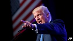 Republican presidential candidate Donald Trump speaks during a campaign rally at the James L. Knight Center, Sept. 16, 2016, in Miami.