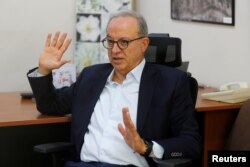 FILE - Marwan Muasher, former Jordanian Foreign Minister, speaks during an interview with Reuters TV in Amman, Jordan, Aug. 14, 2020.