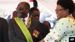 IN GOOD TIMES: President Robert Mugabe and Vice President Joice Mujuru.