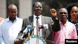 Kenyan opposition leader Raila Odinga (C), the presidential candidate of the National Super Alliance (NASA) coalition speaks during a press conference in Nairobi, Kenya, Sept. 26, 2017.