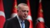 File - Turkey's President Recep Tayyip Erdogan speaks to reporters following a Cabinet meeting, in Ankara, Turkey, Jan. 11, 2021, saying Turkey and Greece will resume talks aimed at reducing tensions between the neighbors on Jan. 25. 