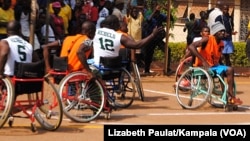 FILE: Disabled athletes play basketball as part of Uganda's Wheelchair Basketball Association.