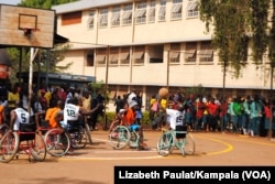 Disabled athletes play basketball as part of Uganda's Wheelchair Basketball Association.