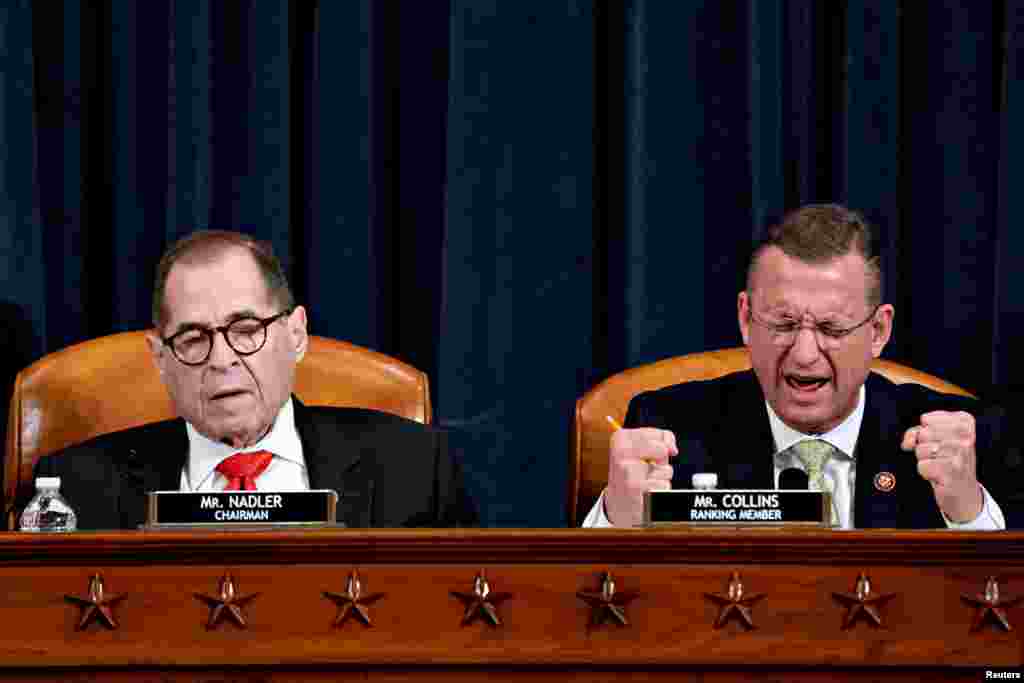 House Judiciary Committee ranking member Rep. Doug Collins, R-Ga., speaks as chairman Rep. Jerry Nadler, D-N.Y., listens during a markup of the articles of impeachment against President Donald Trump, on Capitol Hill in Washington.