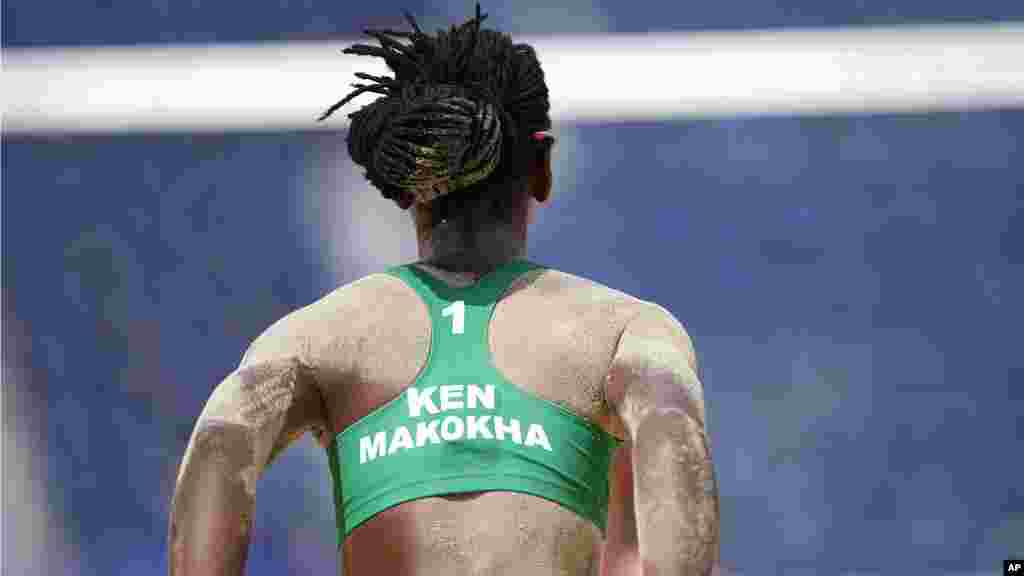 Gaudencia Makokha, of Kenya, is covered in sand as she competes during a women&#39;s beach volleyball match against the United States at the 2020 Summer Olympics, Thursday, July 29, 2021, in Tokyo, Japan. (AP Photo/Petros Giannakouris)