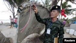 Metallic Debris Found on Thai Beach Likely Japanese Rocket, Not MH370