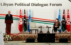 FILE - Tunisia's President Kais Saied speaks during the Libyan Political Dialogue Forum in Tunis, Tunisia, November 9, 2020.