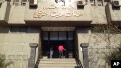 People enter Cairo, Egypt's central morgue where the body of Giulio Regeni, A 28-year-old graduate student, is held, Feb. 4, 2016.