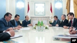 Robert Blake, right, and U.S. delegation meet with counterparts in Tajikistan.