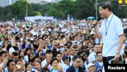 Archbishop of Manila, Luis Antonio Tagle, delivers a message to the participants of the procession against plans to reimpose death penalty, promote contraceptives and intensify drug war during "Walk for Life" in Manila, Philippines, Feb. 18, 2017.