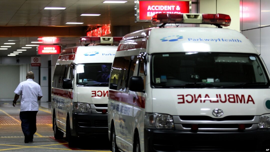 Ambulances are parked outside the accident and emergency entrance at Mount Elizabeth Hospital in Singapore, Dec. 28, 2012. 