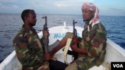FILE - Somali pirates are shown in February 2012.