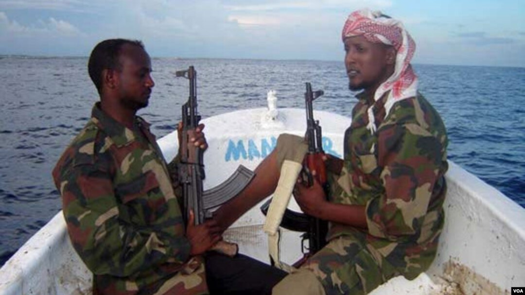 FILE - Somali pirates are shown in February 2012.
