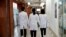 FILE - Medical workers walk at Severance Hospital in Seoul, South Korea, Feb.21, 2024.