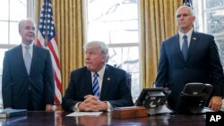 President Donald Trump, flanked by Health and Human Services Secretary Tom Price, left, and Vice President Mike Pence, right, before talking to reporters about the failure of his health care overhaul bill on Friday, March 24, 2017, at the White House. (AP Photo/Pablo Martinez Monsivais)