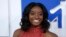 FILE - Olympic gymnast Simone Biles arrives at the 2016 MTV Video Music Awards in New York, Aug. 28, 2016.