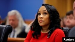 FILE - Fulton County District Attorney Fani Willis attends a hearing on the Georgia election interference case, March 1, 2024, in Atlanta. The judge overseeing the case on March 20 allowed defendant Donald Trump to appeal a ruling letting Willis stay on the case.