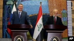 11일 이라크를 방문한 드미트리 로고진 러시아 부총리(왼쪽)가 이브라힘 알 자파리 이라크 외무장관과 공동 기자회견을 하고 있다.