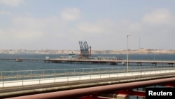 FILE - A general view of Libya's Hariga port in Tobruk, east of Benghazi, June 28, 2014.