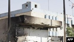 Частково знищений вибухом будинок у Багдаді