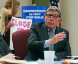 FILE - New York State Board of Elections Commissioner Andrew Spano speaks during a meeting in Albany, N.Y., April 16, 2015.