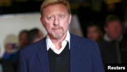 FILE - Former tennis player Boris Becker poses for photographers at the world premiere of the film "I am Bolt" in London, Britain, Nov. 28, 2016. 